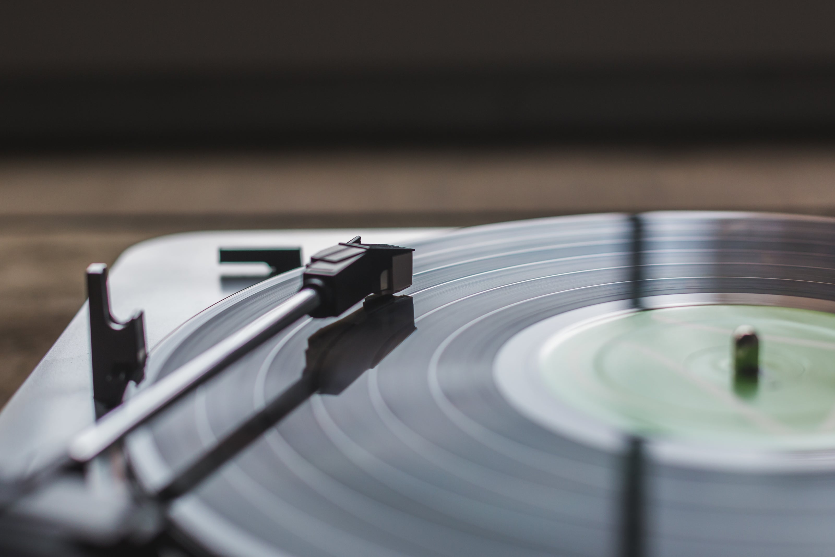 a close up photo of a record on a record player